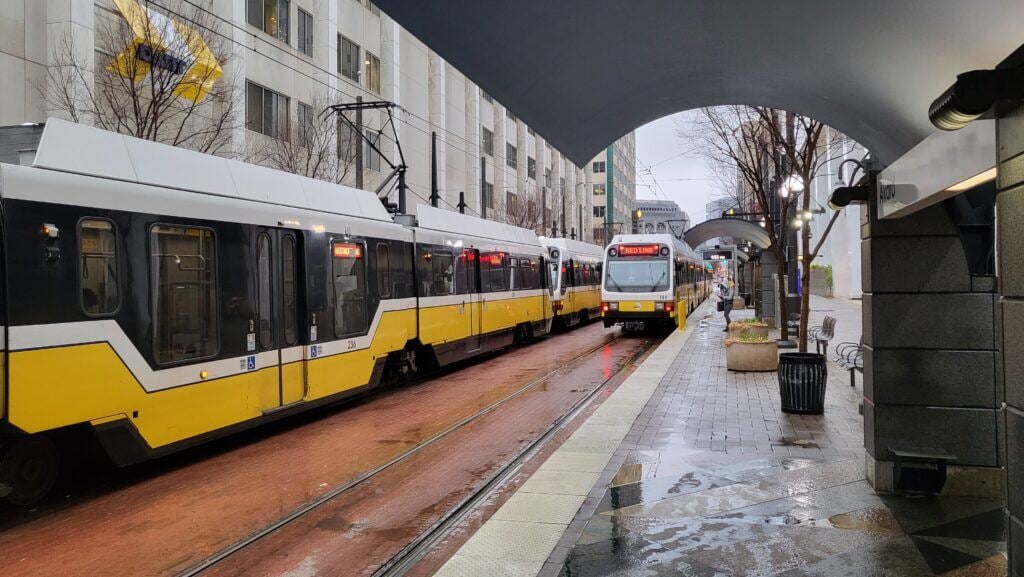 Two street cars at a stop in Dallas, Texas