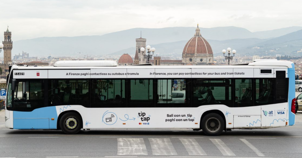 TipTap advertising on a bus wrap in Tuscany.